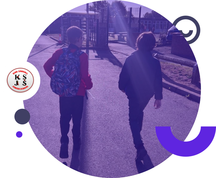 Two primary school children walking to school