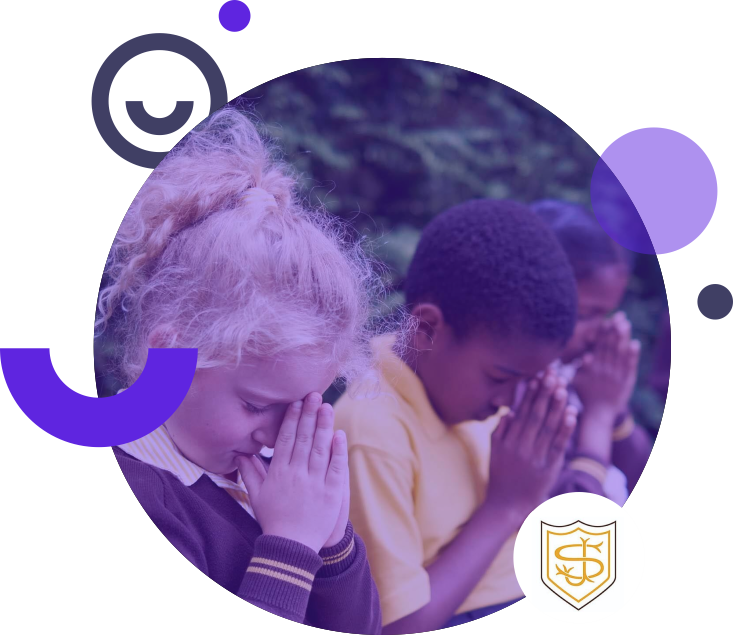 three primary school children praying together